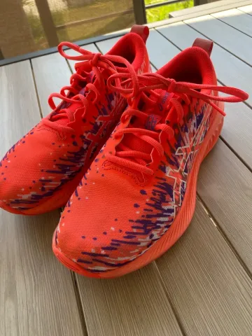 Used Orange Noosa Tri 16 Running Shoes