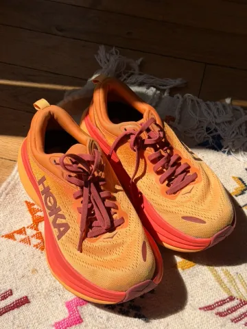 Used Orange Hoka Bondi 8 bike — image 1 of 3