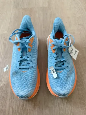 Used Orange HOKA Laufschuhe bike — image 1 of 4