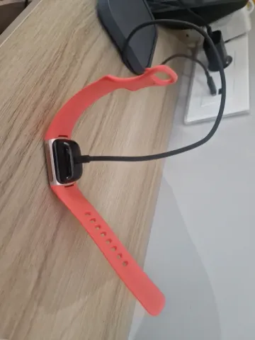 Used Orange Fitbit bike — image 2 of 4