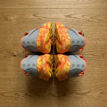 Used Saucony Orange Running Shoes bike — image 2 of 3