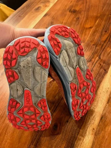 Used Orange Hoka Running Shoes bike — image 5 of 6