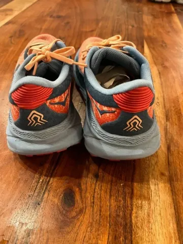Used Orange Hoka Running Shoes bike — image 4 of 6