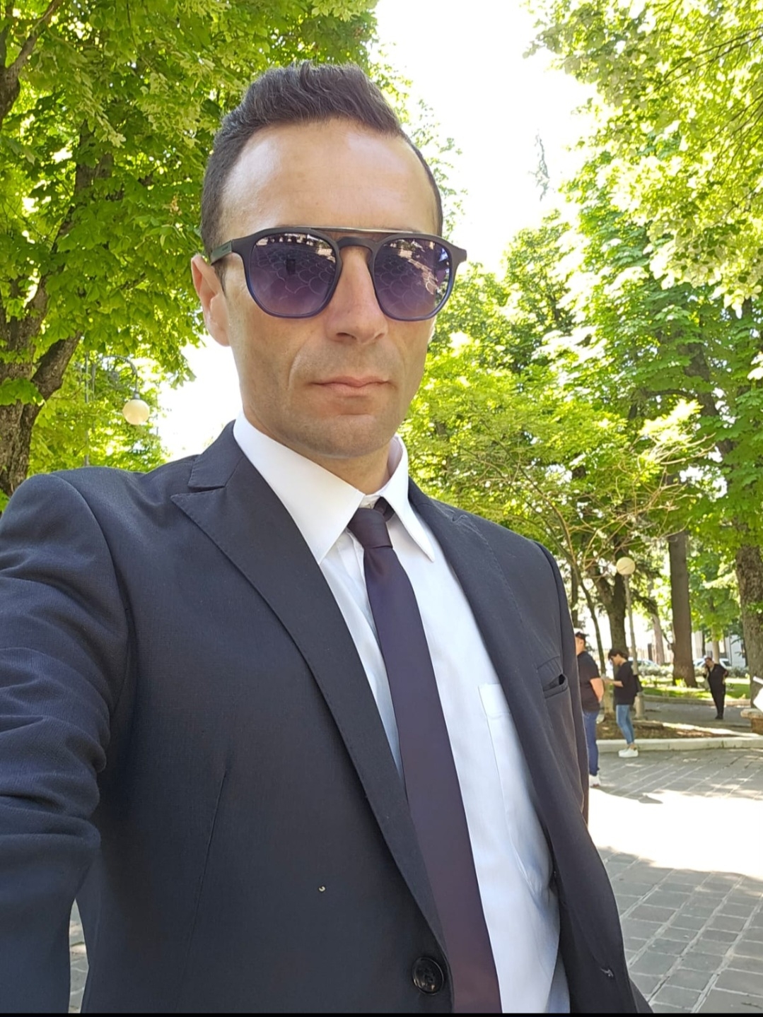 AT